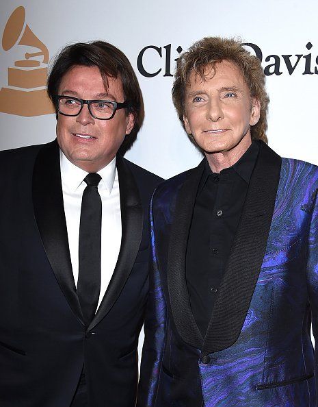Garry Kief and singer Barry Manilow attend the 2016 Pre-GRAMMY Gala and Salute to Industry Icons honoring Irving Azoff at The Beverly Hilton Hotel | Photo: Getty Images