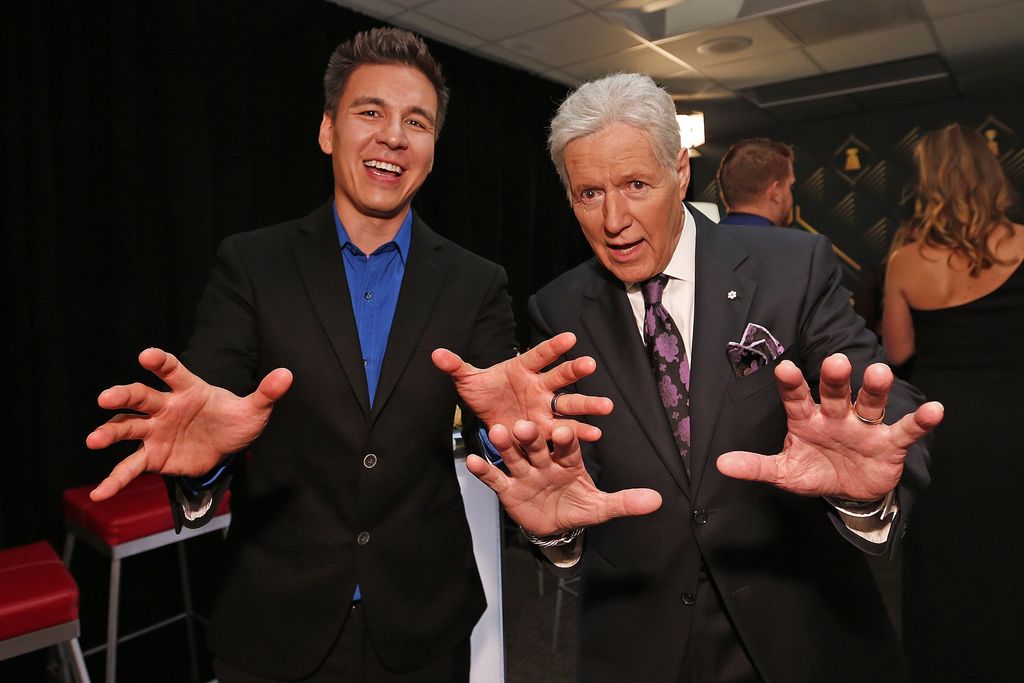 James Holzhauer and Alex Trebek post during the NHL Awards in Las Vegas, Nevada on June 19, 2019 | Photo: Getty Images